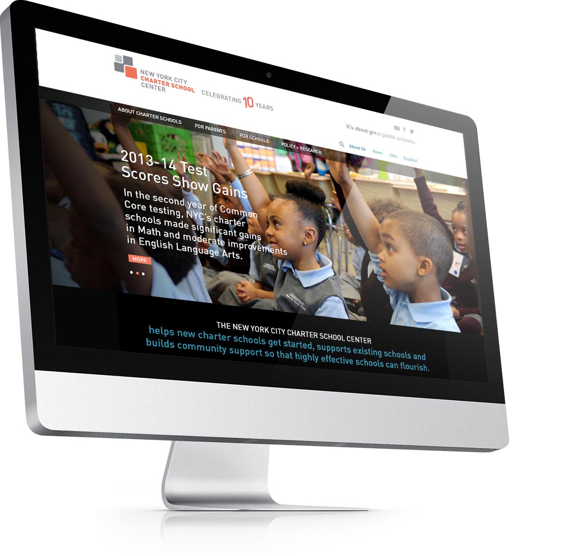 Design of the homepage for the nonprofit website NY City Charter School Center seen on an iMAC.